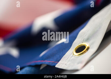 Closeup of American flag on plain background macro Stock Photo