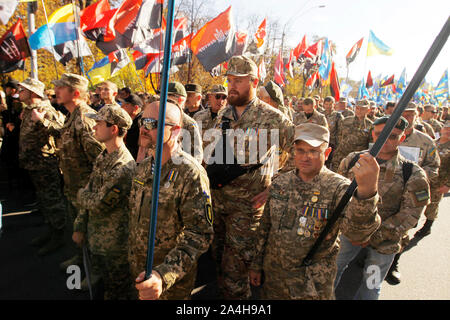Kiev, Ukraine. 14th Oct, 2019. Ukrainian veterans who participated at the war conflict with pro-Russian separatist during the march commemorating the 77th anniversary of the founding of the UPA.The Ukrainian Insurgent Army (UPA) active fought for Ukrainian independence from 1942 to 1949, mostly in Western Ukraine against the German Nazi and Soviet regimes. Ukrainians also mark the Defender of Ukraine Day on the same date. Credit: SOPA Images Limited/Alamy Live News Stock Photo