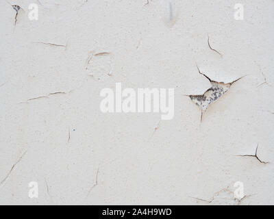 Peeling, blistered, and cracking paint on metal Stock Photo