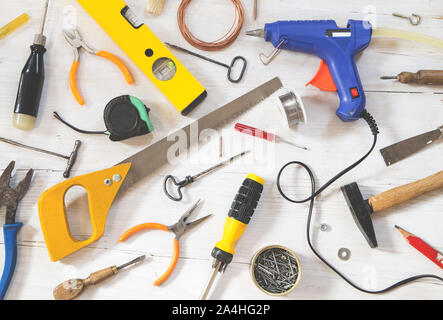 Tools collection on white wooden background Stock Photo