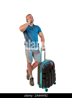 male tourist with a suitcase on a white background Stock Photo