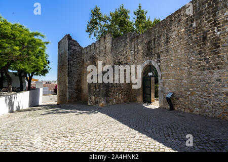 Entrance of the medieval Tavira Castle (Castelo de Tavira), one of the most visited attraction of Tavira, Algarve, Portugal Stock Photo