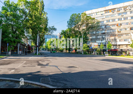 Almaty Common Street Crossroads Traffic Lights Turning on Red for the Vehicles Early in the Morning with Few People and Cars Stock Photo