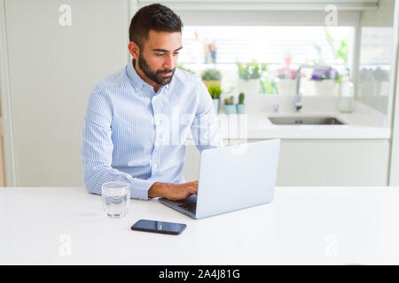 Business man concentrated working using computer laptop Stock Photo