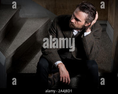 portrait of bearded man in coat Stock Photo