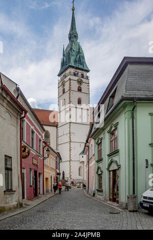 JINDRICHUV HRADEC - CZECH REPUBLIC - JUNE 04, 2016: Street scene with church in the city of 'Jindrichuv Hradec' which means Henry's Castle, South Bohe Stock Photo