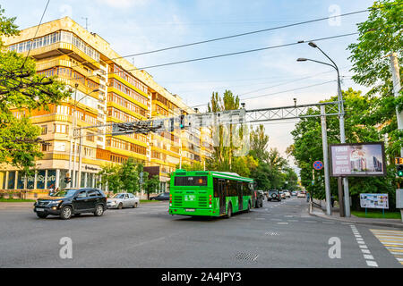 Almaty Abay Street Crossroads Traffic Lights Turning on Green for the Vehicles on a Sunny Blue Sky Day Stock Photo