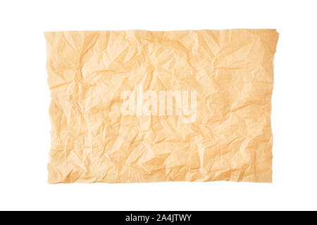 Crumpled piece of parchment or baking paper isolated on white background. Top view. Copy space for text and design element. Stock Photo
