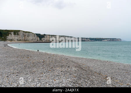 View of the rocky beach and limestone cliffs on the alabaster coast of Normandy in Fecamp Stock Photo