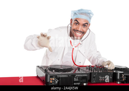 Mad African musician singer with stethoscope playing doctors  with a DJ music system Stock Photo