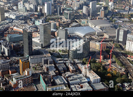 aerial view of Manchester city centre Manchester Victoria Station, Angel Square, CIS Tower, Manchester Arena etc viewing west down Rochdale Rd, UK Stock Photo