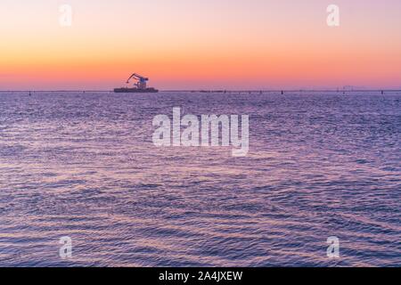 Sunset over the Venice lagoon with a ferry Stock Photo - Alamy