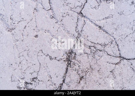 White stone with small cracks on the surface Stock Photo
