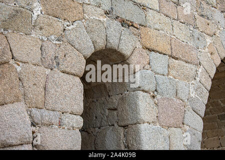 Arched stones forming an eye of the Roman bridge of Merida, in Spain Stock Photo