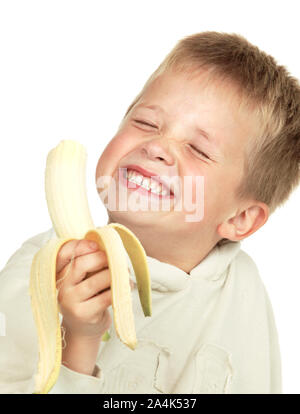 Boy eating banana Stock Photo