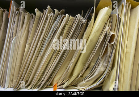alphabetical order - alphabeth - in a row - filing documents - files- research - bureaucracy - storage room - historical order confirmity -organizatio Stock Photo