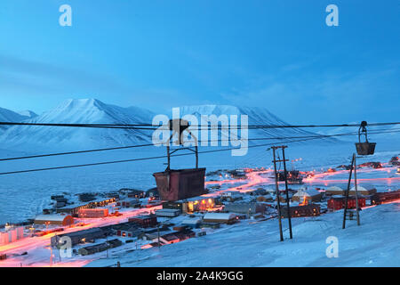 The town Longyearbyen on the island Spitsbergen at Svalbard. Carriages to transport coal from the coal mine. Stock Photo