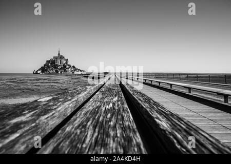Mont Saint-Michel Road and Bridge on a Sunny Summer Day in Normandy France - Black and White Stock Photo