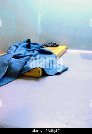 Padded cell with a mattress. Stock Photo