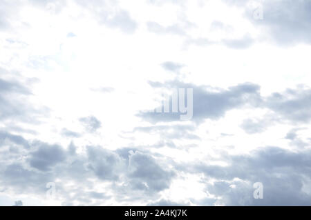 white fluffy clouds in the blue sky Stock Photo