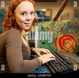 Student working on laptop Stock Photo