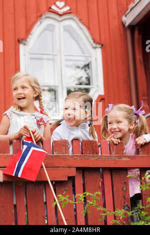 Little girls celebrating 17th of May in Norway Stock Photo