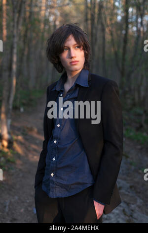Portrait Of Young Man In Wood Stock Photo