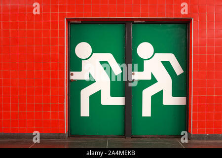 Exit sign on door Stock Photo