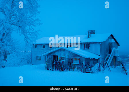 Wooden barn in winter scenery Stock Photo