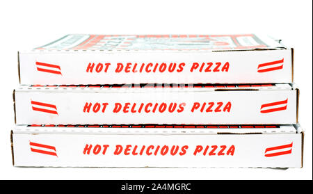 Stack of red and white pizza boxes. White background. Horizontal. Stock Photo