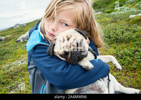 Girl with pug Stock Photo