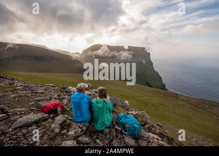 Hikers looking at view Stock Photo