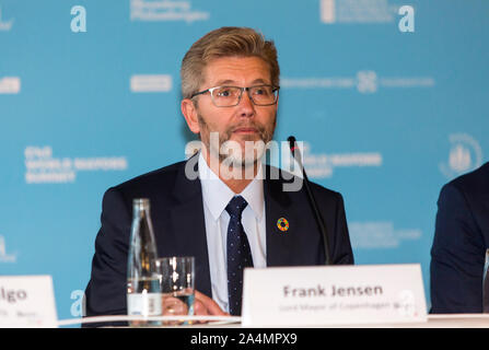 COPENHAGEN, DENMARK – OCTOBER 09, 2019: Frank Jensen, Lord Mayor of Copenhagen, speaks during the C40 World Mayors Summit opening press conference at Copenhagen City Hall. More than 90 mayors of some of the world’s largest and most influential cities representing some 700 million people meet in Copenhagen from October 9-12 for the C40 World Mayors Summit. The purpose with the summit in Copenhagen is to build a global coalition of leading cities, businesses and citizens that rallies around radical and ambitious climate action. Also youth leaders from the recent Climate Strike participate.  From