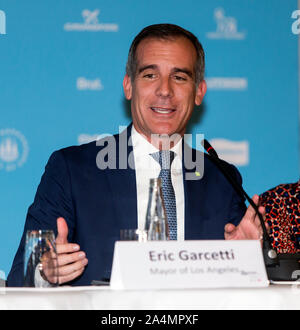 COPENHAGEN, DENMARK – OCTOBER 09, 2019: Mayor of Los Angeles and the coming Chair for the C40 World Mayors, Eric Garcetti, speaks during the C40 World Mayors Summit opening press conference at Copenhagen City Hall. More than 90 mayors of some of the world’s largest and most influential cities representing some 700 million people meet in Copenhagen from October 9-12 for the C40 World Mayors Summit. The purpose with the summit in Copenhagen is to build a global coalition of leading cities, businesses and citizens that rallies around radical and ambitious climate action. Also youth leaders from t