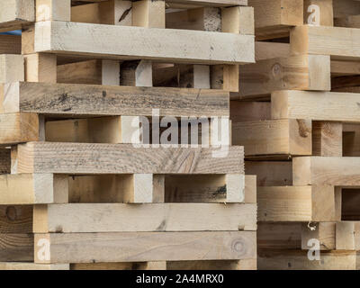 Stacked Wooden Pallets on Construction Site Stock Photo - Alamy