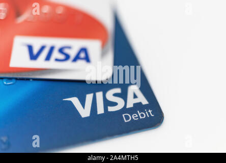 London / UK - October 9th 2019 - VISA logo on bank cards, closeup macro view with a shallow depth of field Stock Photo