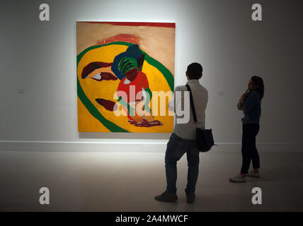 Malaga, Spain. 15th Oct, 2019. Visitors looking at a painting during the exhibition.'Eleuthera' is an exhibition at Contemporary Art Center with more than 40 works from Sean Scully as paintings, photographs and large format drawings. The artist uses colorful shapes and geometrical whose concepts are imaginational, abstract and fatherhood. The exhibit will run from 15 October until 19 January 2020. Credit: SOPA Images Limited/Alamy Live News Stock Photo