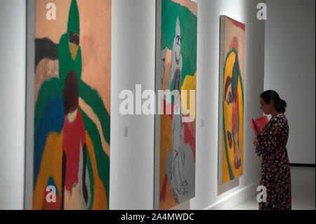Malaga, Spain. 15th Oct, 2019. A visitor looks at a painting during the exhibition.'Eleuthera' is an exhibition at Contemporary Art Center with more than 40 works from Sean Scully as paintings, photographs and large format drawings. The artist uses colorful shapes and geometrical whose concepts are imaginational, abstract and fatherhood. The exhibit will run from 15 October until 19 January 2020. Credit: SOPA Images Limited/Alamy Live News Stock Photo
