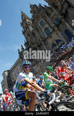 Alberto Contador passes by the front of the Obradoiro of the Cathedral of Santiago de Compostela before the stage of La Vuelta 2012 between Santiago d Stock Photo