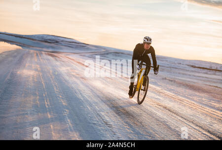 Man cycling at winter Stock Photo