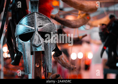 Halloween gladiator helm from ancient Rome. Courage, battle and freedom themes. October holidays, fall 2019. Stock Photo