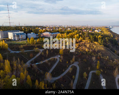 Aerial top vew of winding road in the city Stock Photo