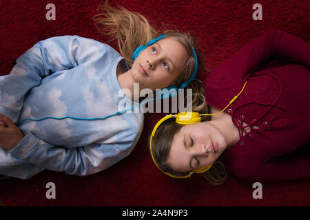 Girls listening music Stock Photo