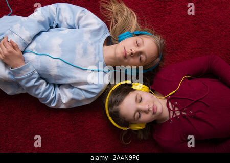 Girls listening music Stock Photo