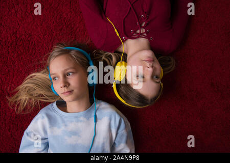 Girls listening music Stock Photo