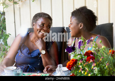 Two women having tea Stock Photo