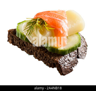 Cucumbers Cheese and Lox on Dark Bread Stock Photo