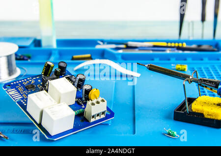 The electrician's workplace. Electronics. Schemes soldering iron Stock Photo