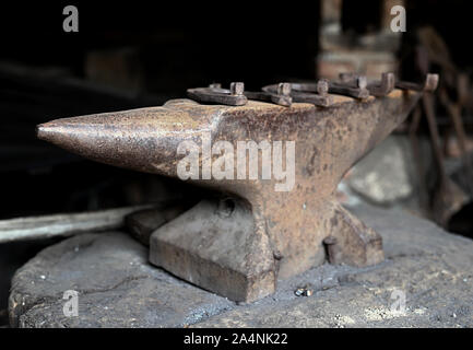 old anvil, nails and horseshoes Stock Photo