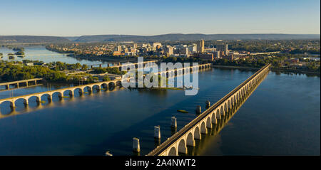 Morning light hits the buildings and bridges downtown city center area in Pennsylvania state capital at Harrisburg Stock Photo